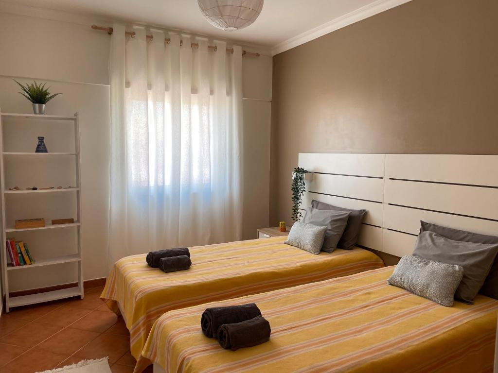 Postel nebo postele na pokoji v ubytování Tamara's Apartment