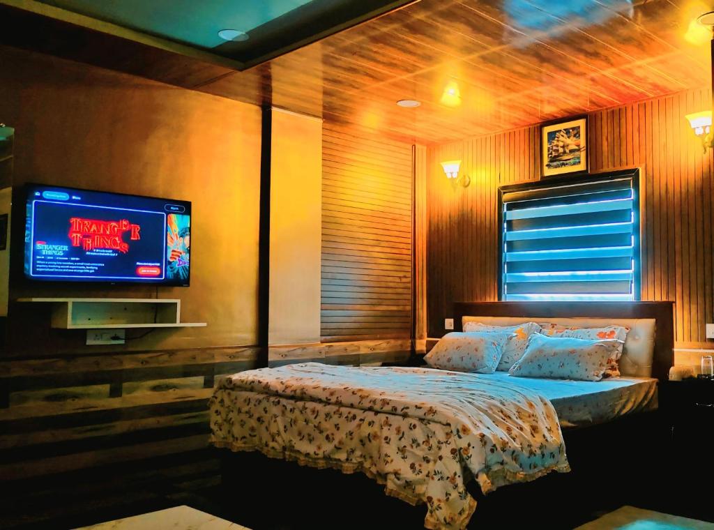 Ένα ή περισσότερα κρεβάτια σε δωμάτιο στο Black bird hotel and restaurant