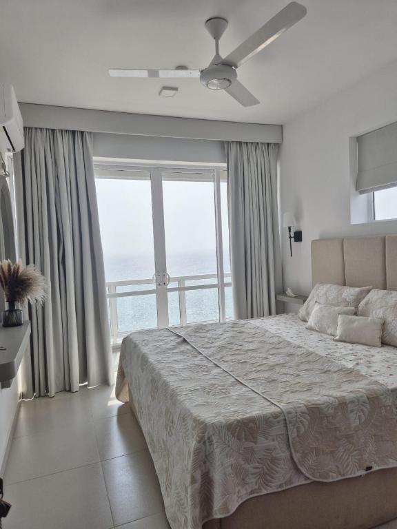 Ένα ή περισσότερα κρεβάτια σε δωμάτιο στο Casa del Mare