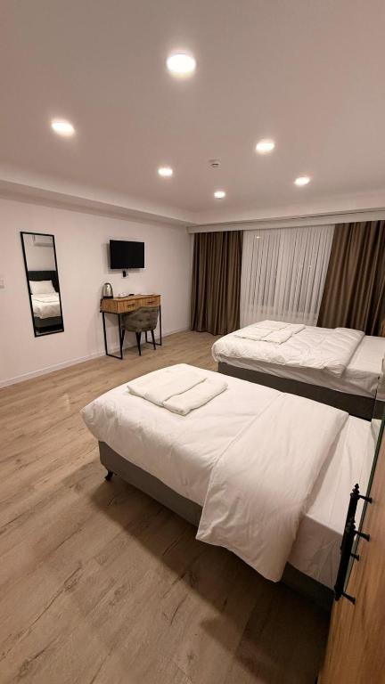 Mütena konaklama - Dreibettzimmer