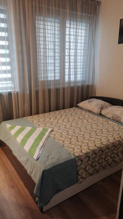 Postel nebo postele na pokoji v ubytování Апартамент войвода