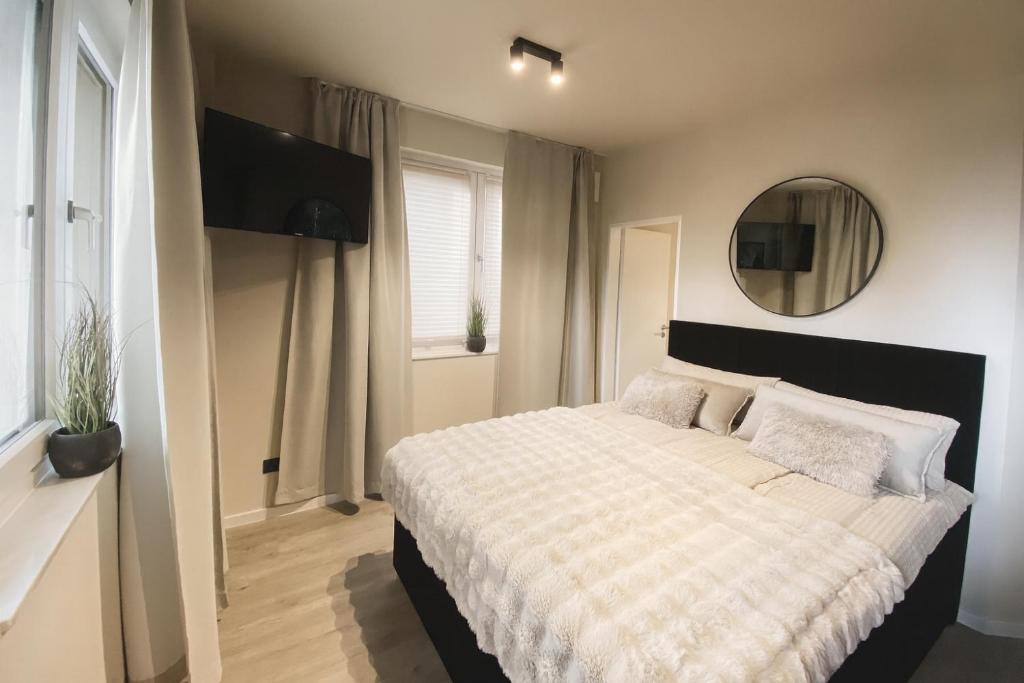 Postel nebo postele na pokoji v ubytování Passion 4U Airport