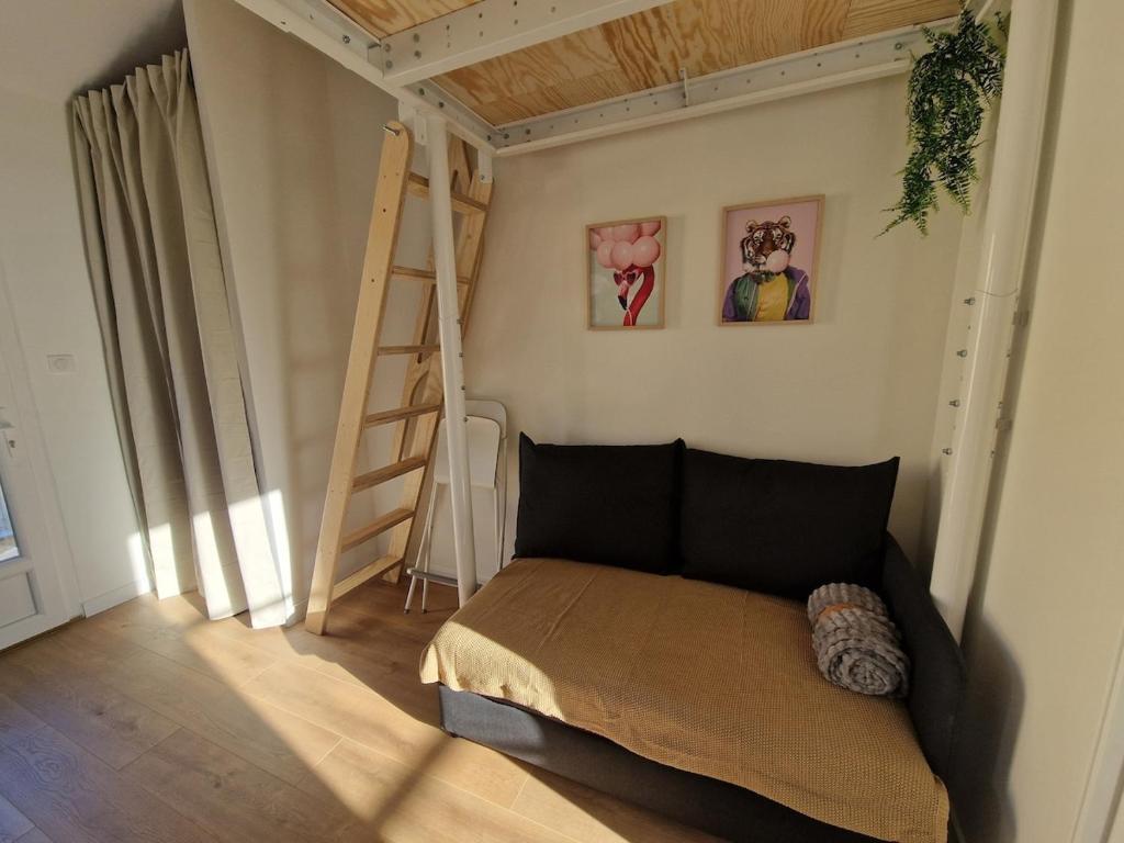 Una cama o camas en una habitación de Duplex studio