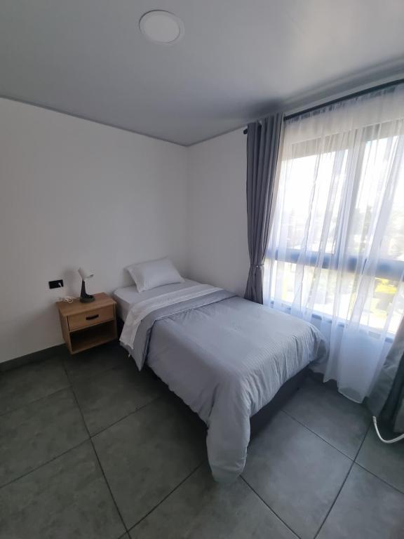 Giường trong phòng chung tại Andes Coliving