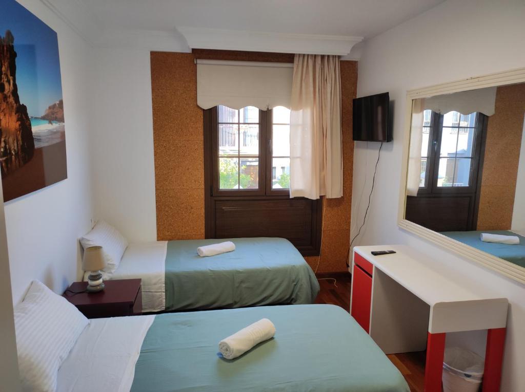 Postel nebo postele na pokoji v ubytování casa cairasco