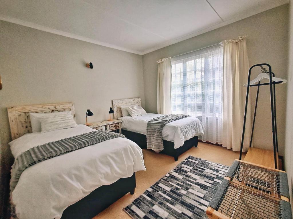 Postel nebo postele na pokoji v ubytování Swannie Creek