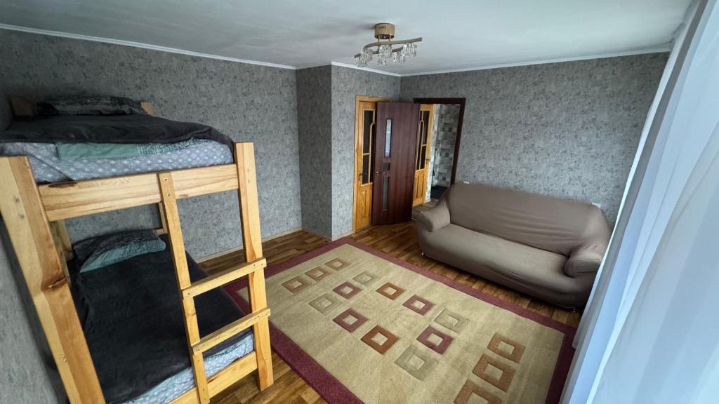 Ένα ή περισσότερα κρεβάτια σε δωμάτιο στο GoSumy Hostel