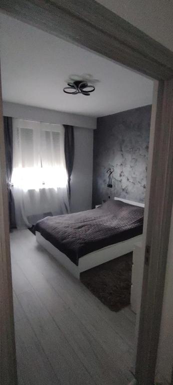 Ένα ή περισσότερα κρεβάτια σε δωμάτιο στο LCB Apartments P Victoriei Ploieşti