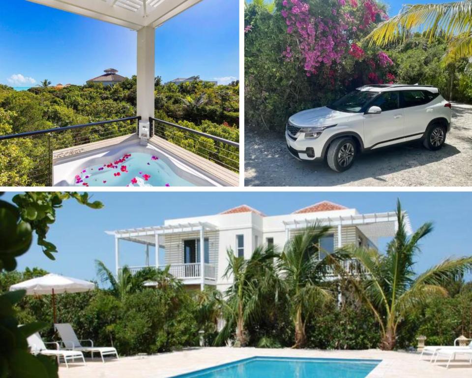 a house with a pool and a car parked next to it at Wyakha Duplex 1 & 2 in Long Bay Hills