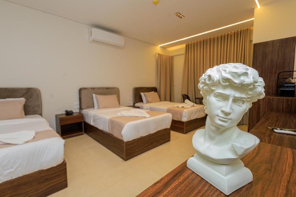 Ένα ή περισσότερα κρεβάτια σε δωμάτιο στο Imperial Residence