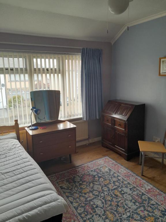 En eller flere senge i et værelse på Sweetdreams