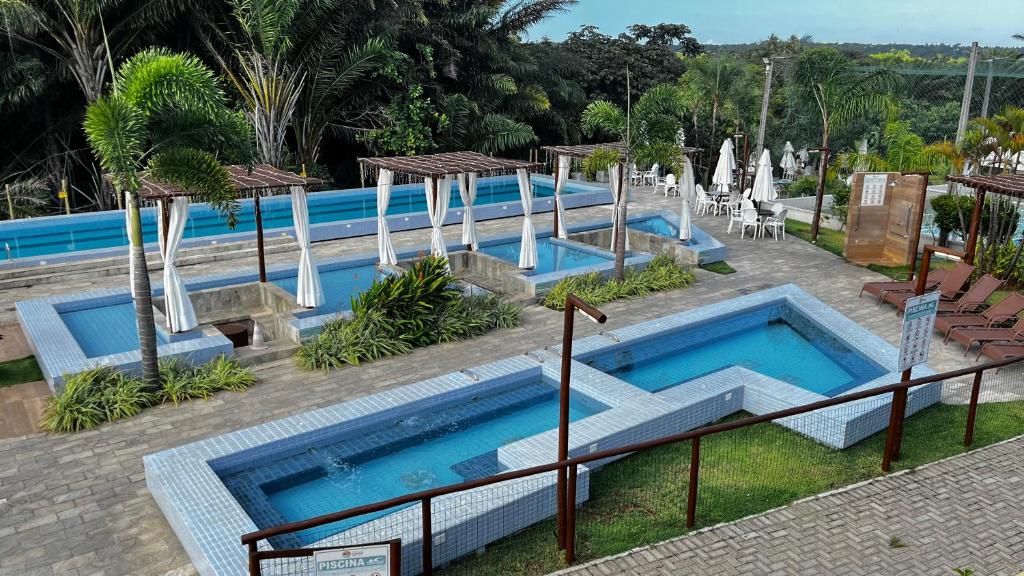 Swimmingpoolen hos eller tæt på Refúgio com lazer completo em Pium RN