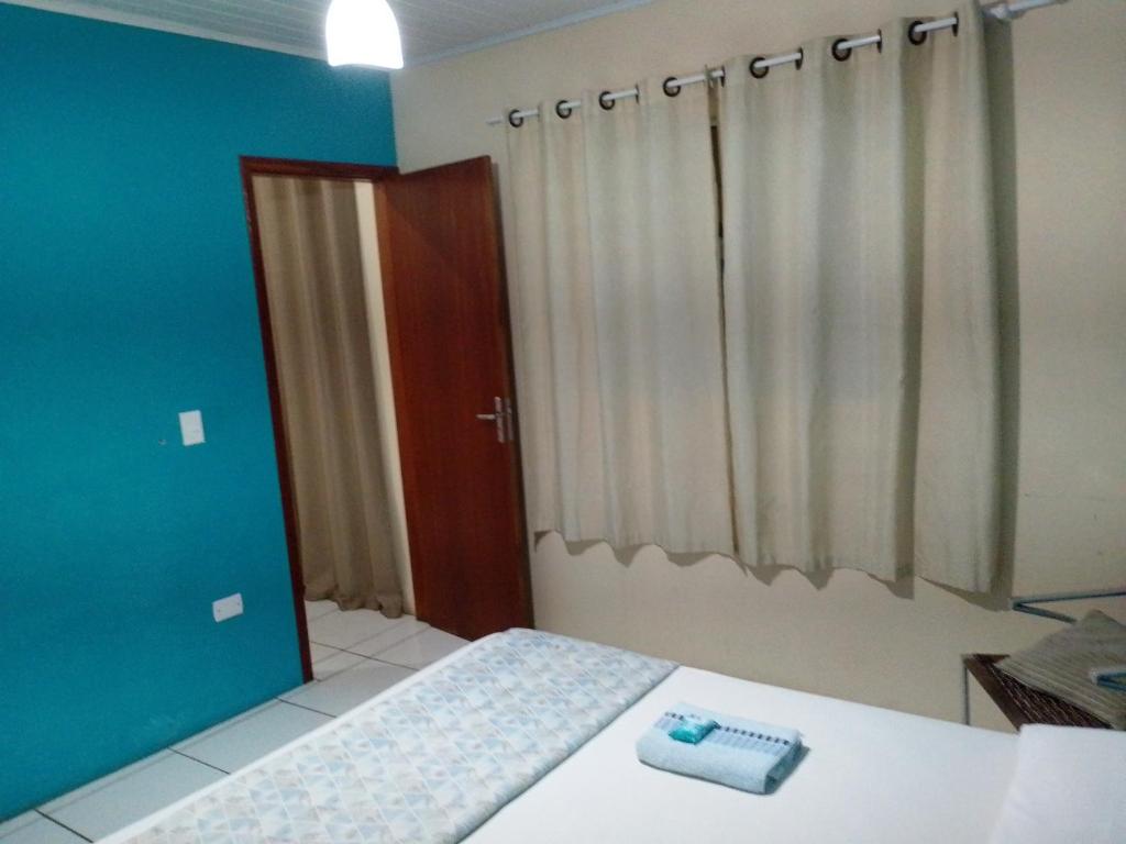 Voodi või voodid majutusasutuse Pousada Jasmim Paraty toas