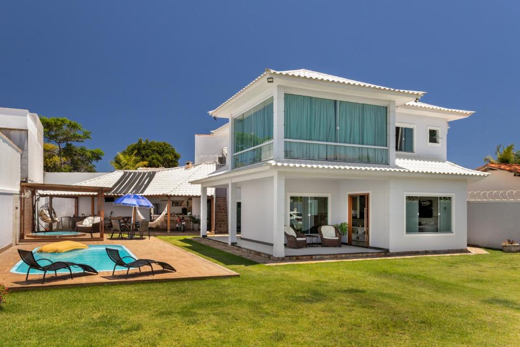 Κήπος έξω από το Mansão em Itauna - Saquarema - Com piscina para ate 16 pessoas