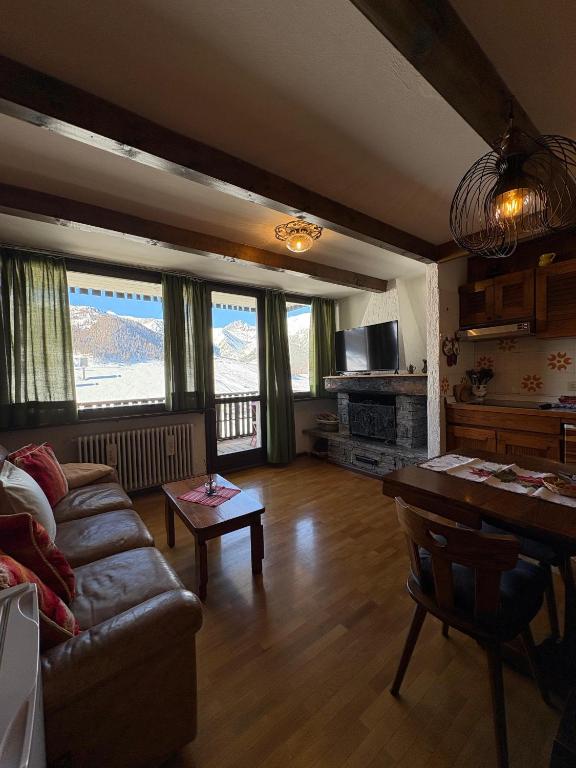 Et tv og/eller underholdning på Appartamento Montebello