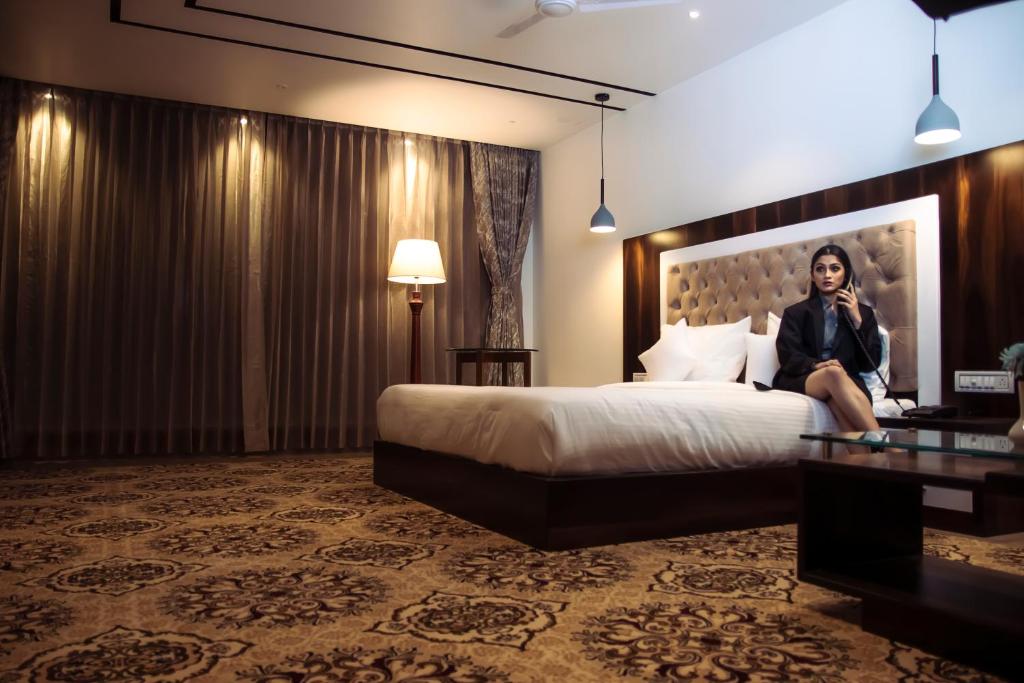 Ένα ή περισσότερα κρεβάτια σε δωμάτιο στο Hotel Hilltrip