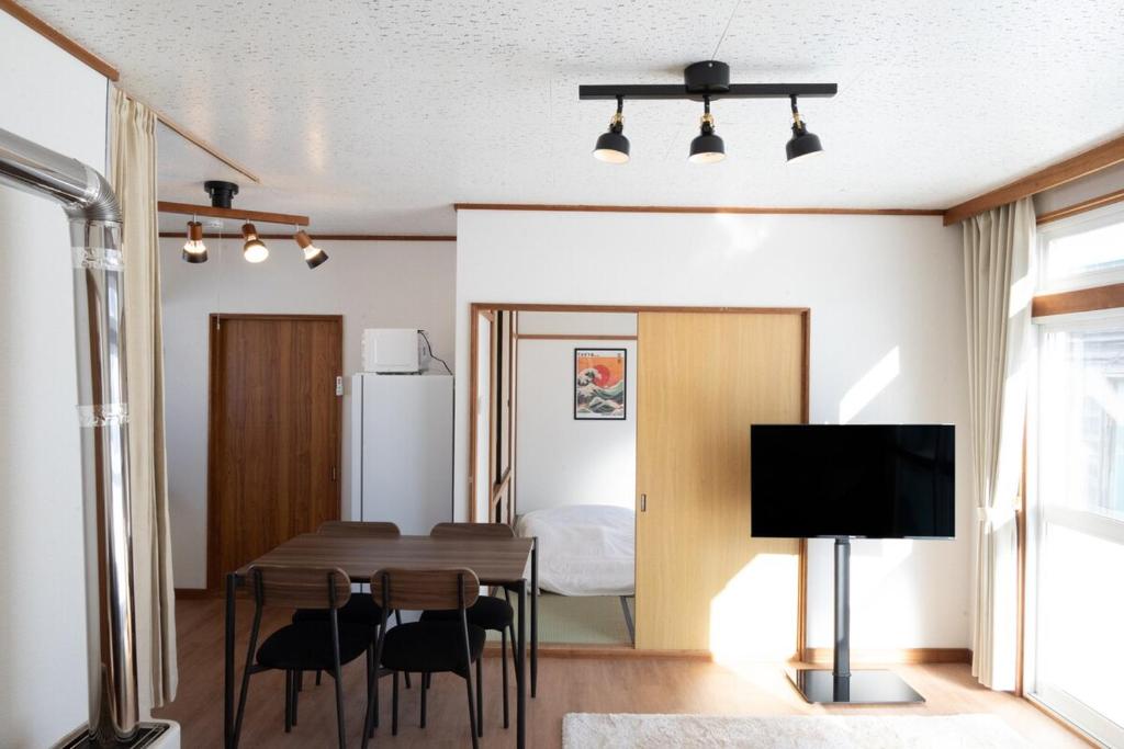 TV a/nebo společenská místnost v ubytování Furano Relax Stay C