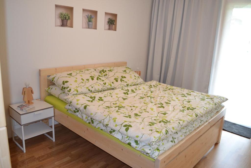 Postel nebo postele na pokoji v ubytování Apartmán Medvědín 109