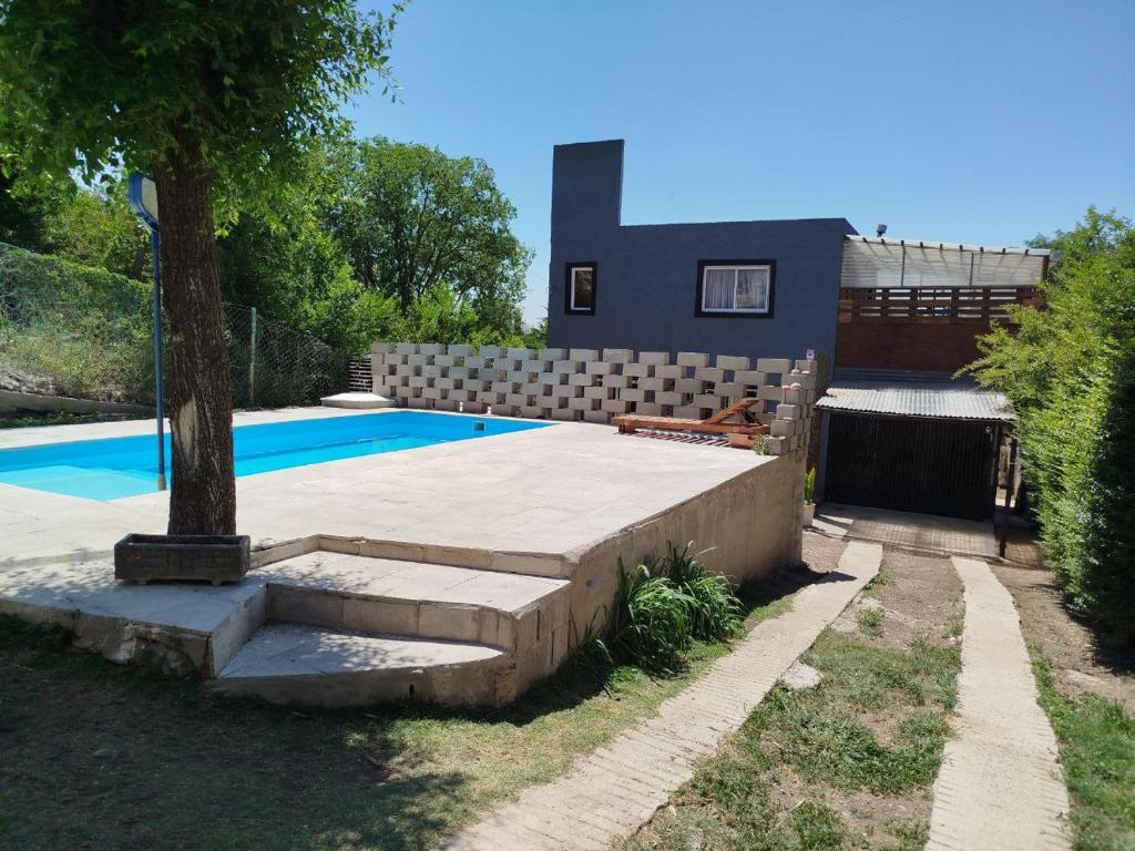 Bazén v ubytování Casa 2 dormitorios con pileta nebo v jeho okolí