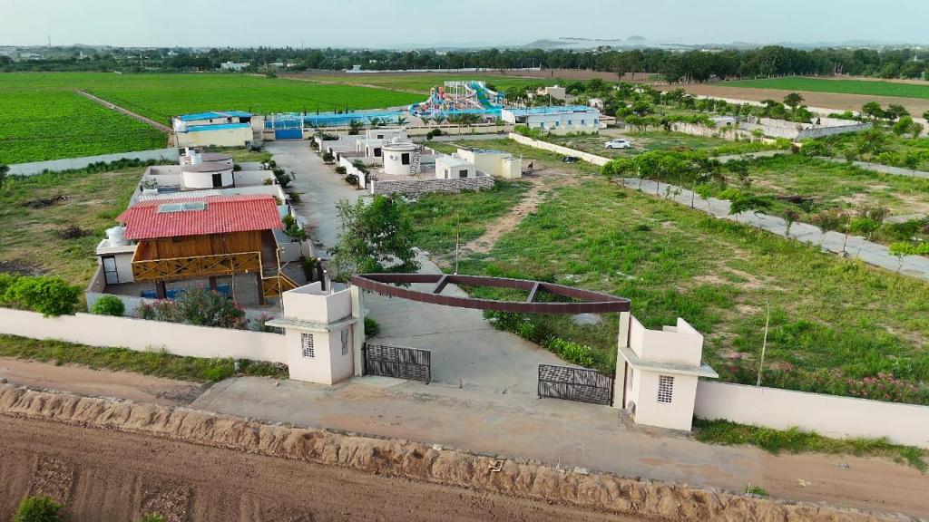 an aerial view of a water park with a roller coaster at Aqua Dream Water Park in Bhuj