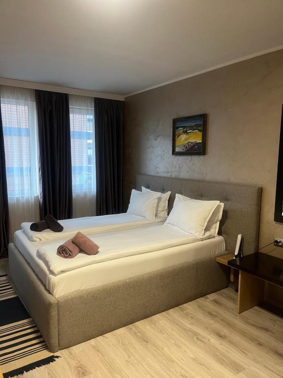 Ένα ή περισσότερα κρεβάτια σε δωμάτιο στο Paradise dreams Velingrad