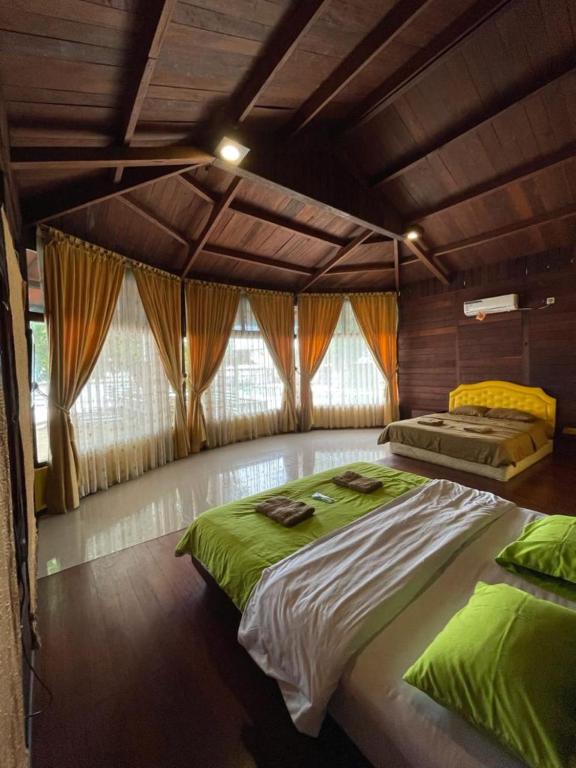 Ένα ή περισσότερα κρεβάτια σε δωμάτιο στο Mooi Park