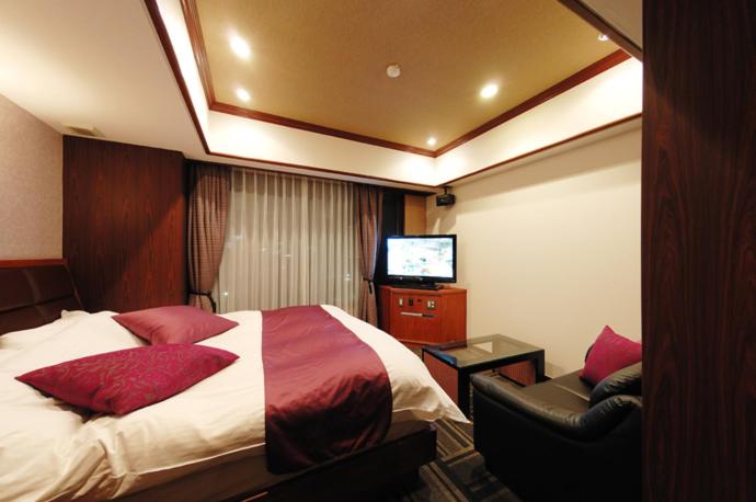 Postel nebo postele na pokoji v ubytování Hotel Water Gate Nagoya - Love Hotel for couple -