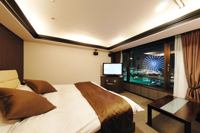 Postel nebo postele na pokoji v ubytování Hotel Water Gate Nagoya - Love Hotel for couple -