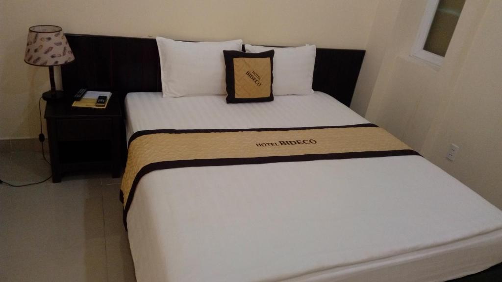 Postel nebo postele na pokoji v ubytování Bideco Hotel