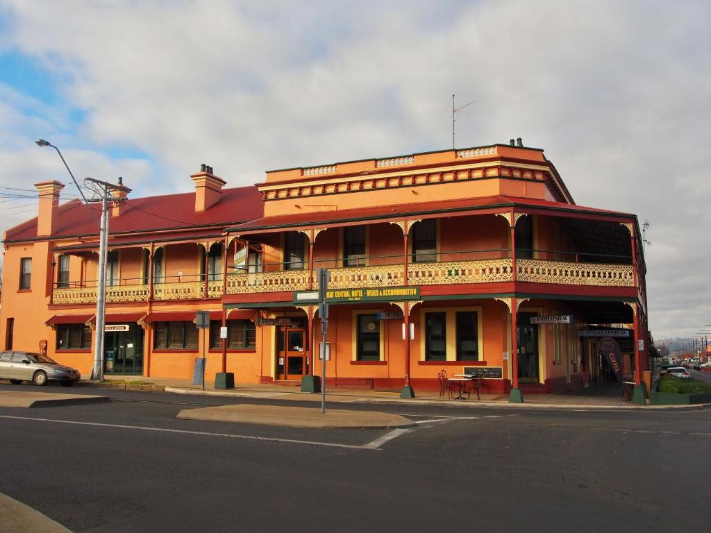 a large orange building on the corner of a street at Great Central Hotel in Glen Innes