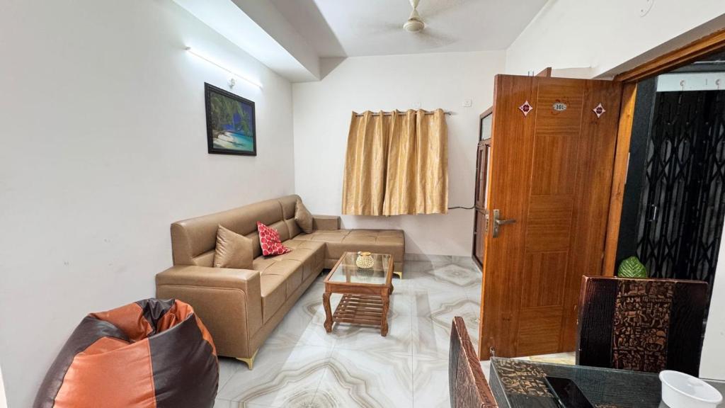 Posezení v ubytování Sreeprada Homes