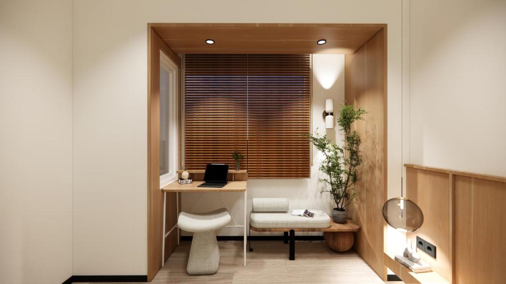 a home office with a desk and a chair at Bogorienze City Resort in Pamoyanan