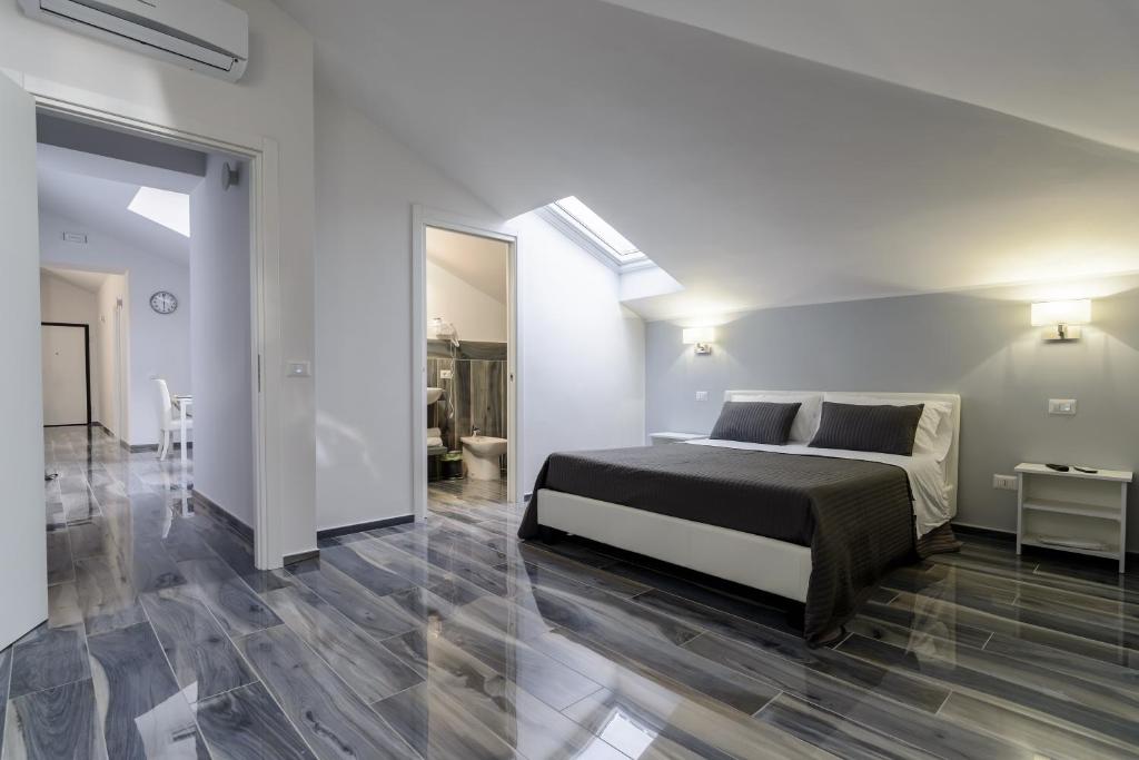 Posteľ alebo postele v izbe v ubytovaní B&B al Palazzo