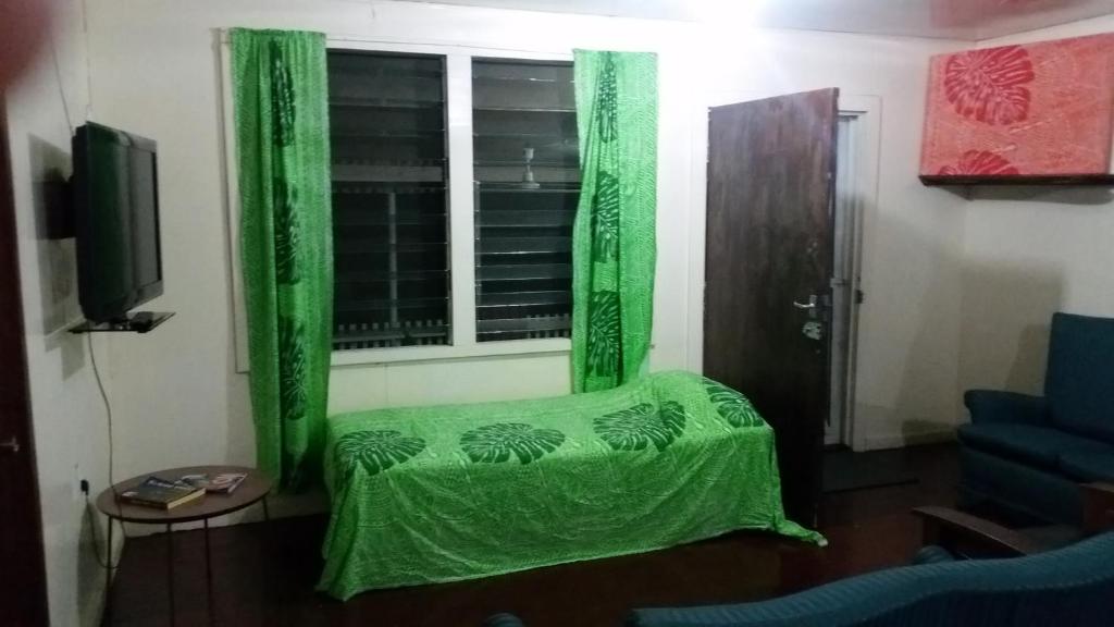 TV a/nebo společenská místnost v ubytování Samoa Home