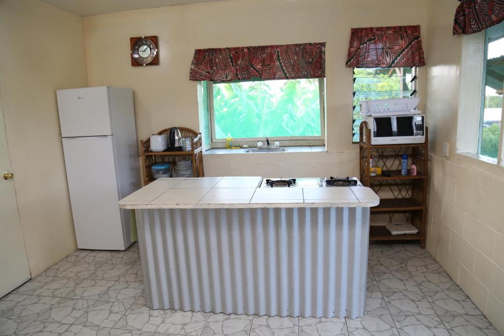 Kuchyň nebo kuchyňský kout v ubytování Samoa Home