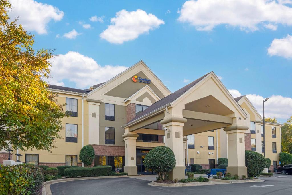 a rendering of a hotel with a building at Comfort Inn & Suites Spartanburg North in Spartanburg
