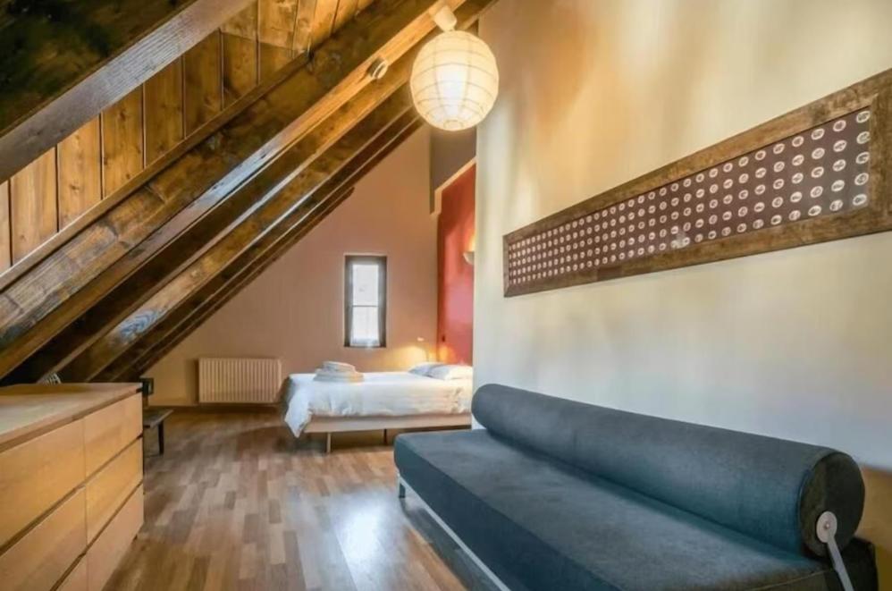 Ένα ή περισσότερα κρεβάτια σε δωμάτιο στο Hotel Nau Iori