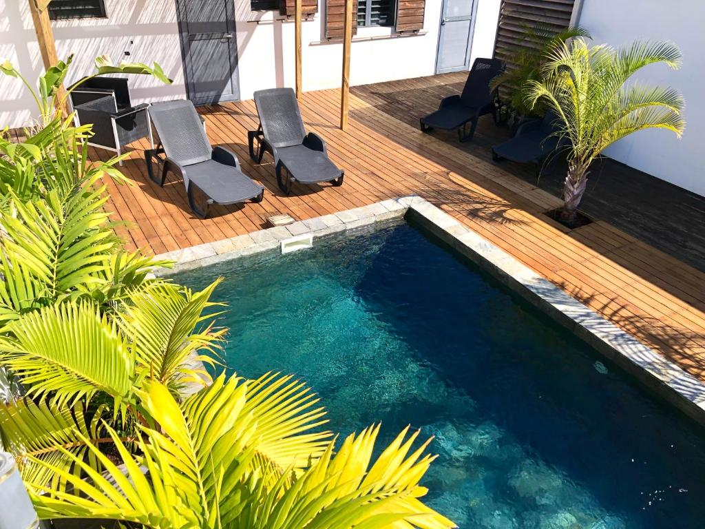 Bazén v ubytování Rosea - Gayarticaz Reunion nebo v jeho okolí