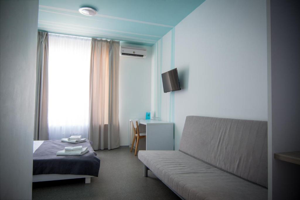 TV a/nebo společenská místnost v ubytování Volna Hotel