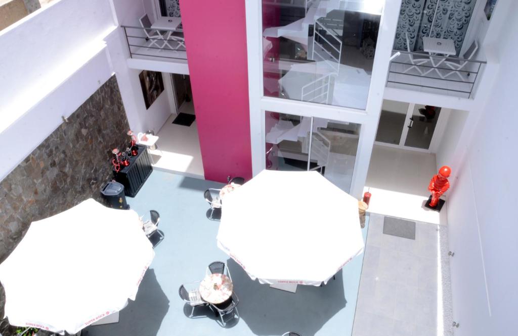 Posezení v ubytování Prassa 3 Boutique Hotel