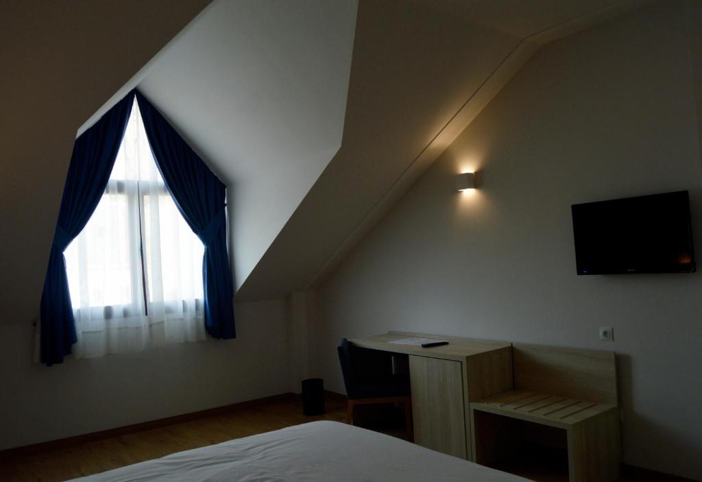 TV a/nebo společenská místnost v ubytování Hotel Balneario de Graena