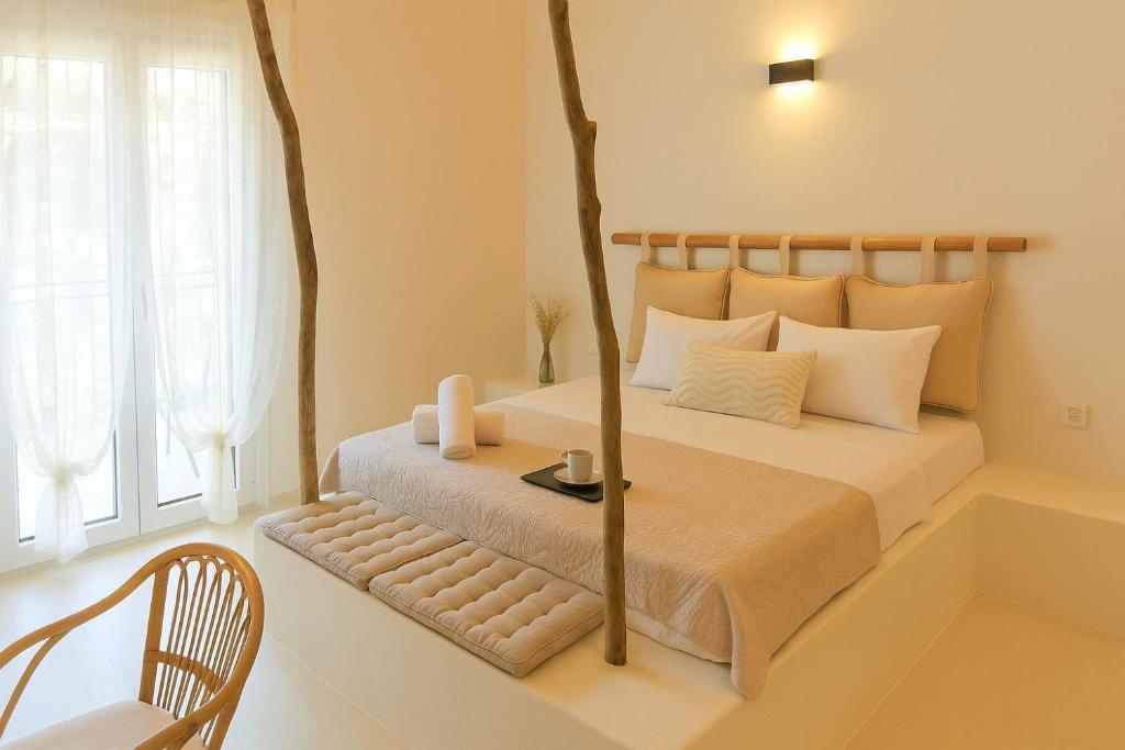 Ένα ή περισσότερα κρεβάτια σε δωμάτιο στο Corfu's Hidden Gem - Serene Quad