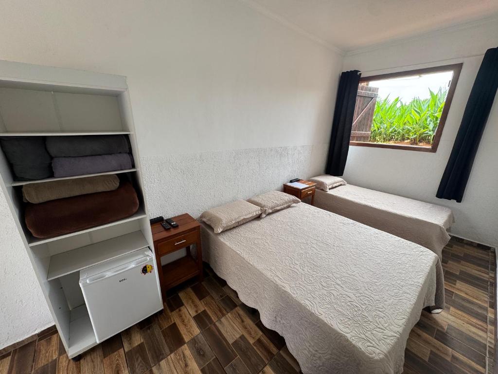 Postel nebo postele na pokoji v ubytování Pousada Fernandes