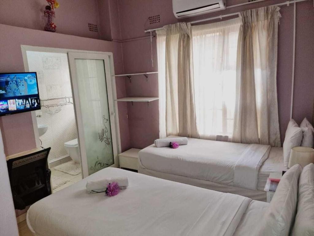 Ένα ή περισσότερα κρεβάτια σε δωμάτιο στο Apelles Palace Guest House - Standard room 1