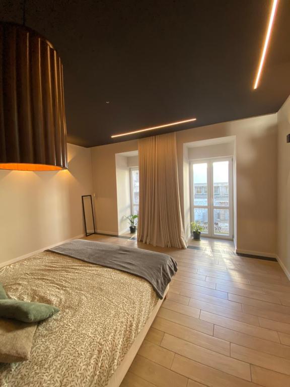 Кровать или кровати в номере Casa dos Camilos - Douro View Terrace House