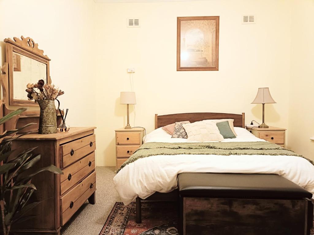 Ένα ή περισσότερα κρεβάτια σε δωμάτιο στο My River Retreat