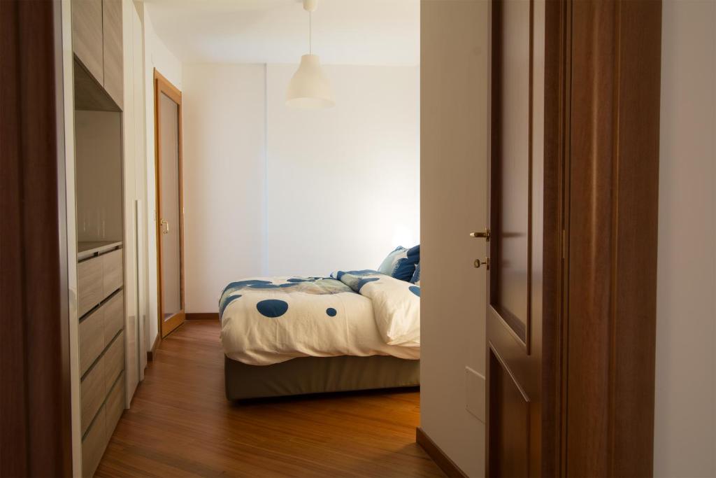 A bed or beds in a room at La Mia Casa Romana