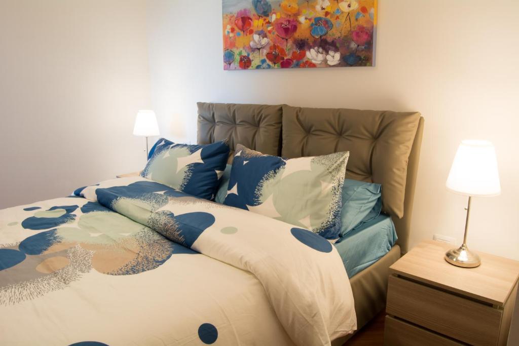 A bed or beds in a room at La Mia Casa Romana