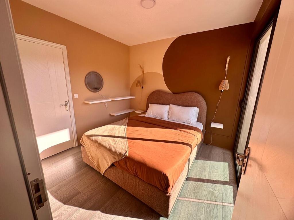 Ένα ή περισσότερα κρεβάτια σε δωμάτιο στο Sunkissed Haven