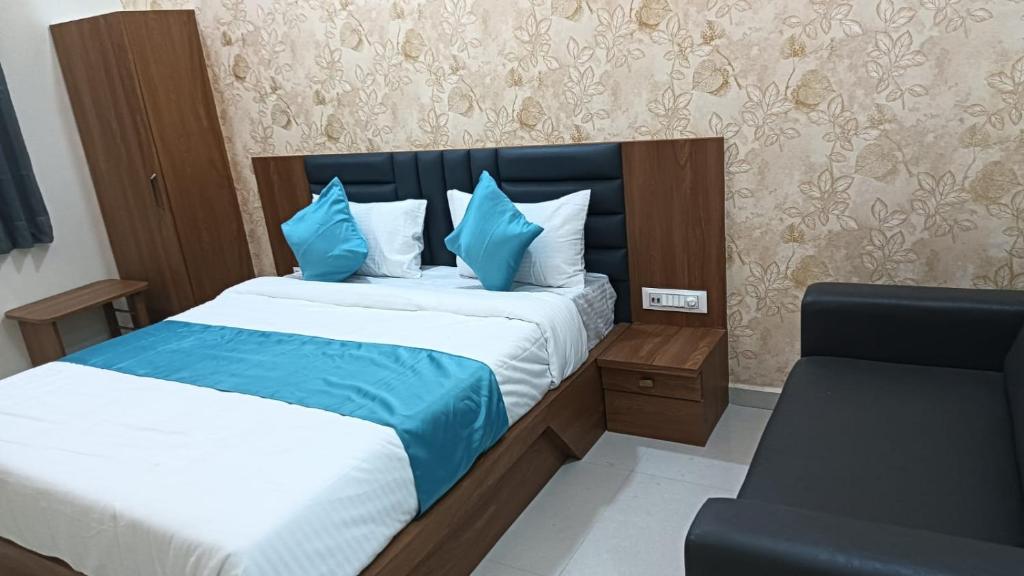 Postel nebo postele na pokoji v ubytování Hotel Empire